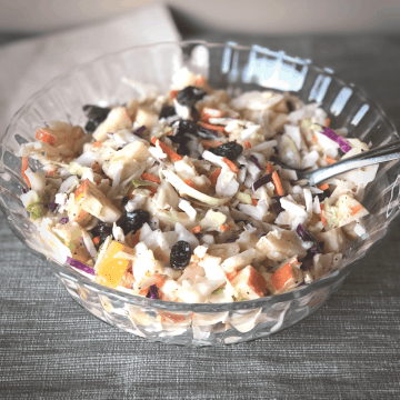 A bowl of dairy and egg free apple coleslaw