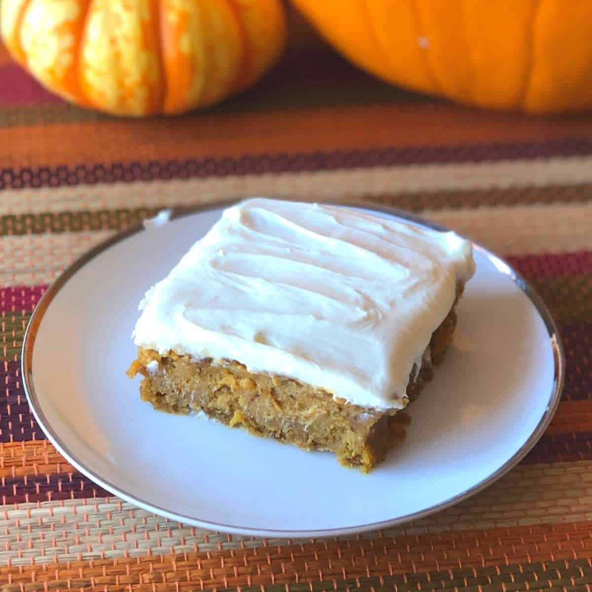 An allergy friendly pumpkin bars on a white plate