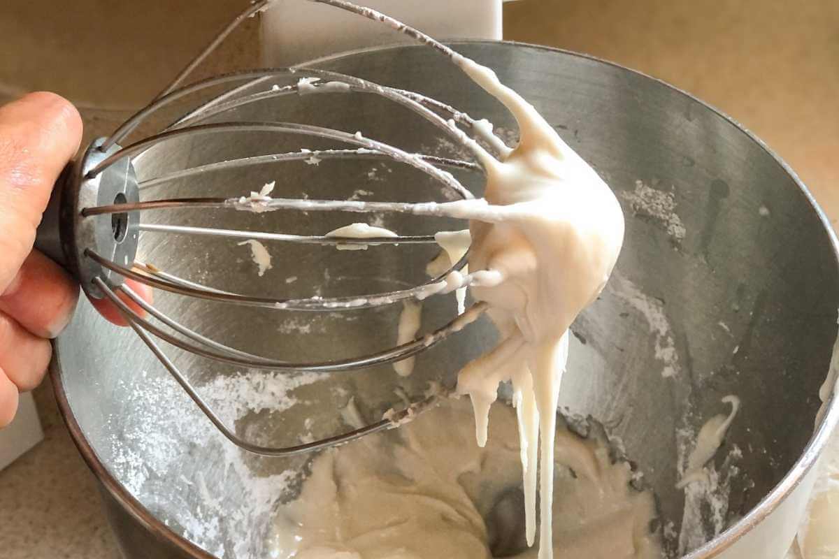 Powdered sugar frosting on a mixing beater