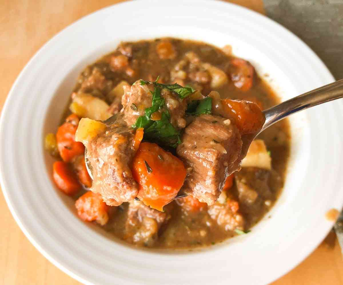 A spoonful of gluten free beef stew.