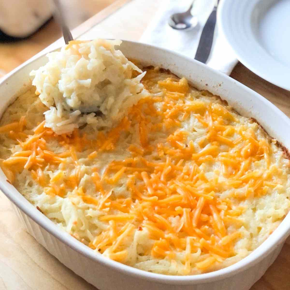 gluten free cheesy potatoes in a casserole dish