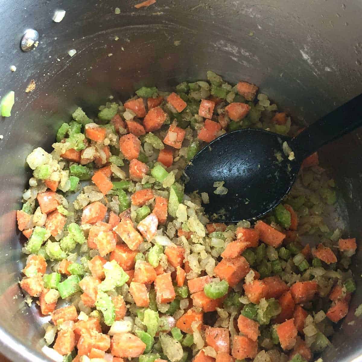 Carrots, celery, and onion mixture coated in gluten free flour