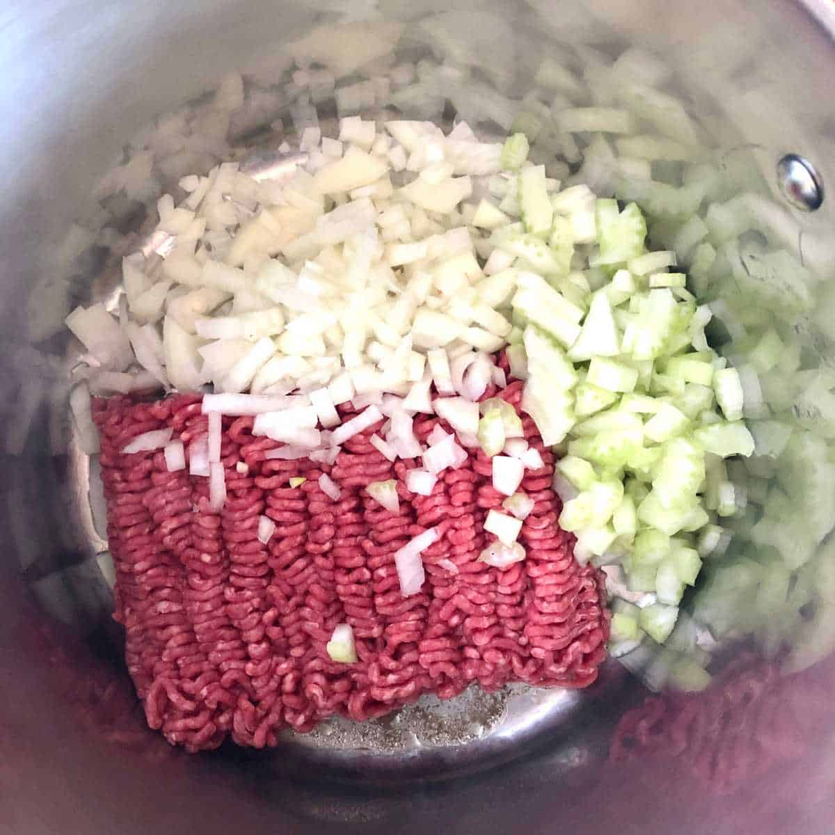 ground beef, onions, and celery in a large pot