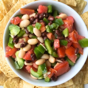 A bowl of redneck caviar surrounded by tortilla chips