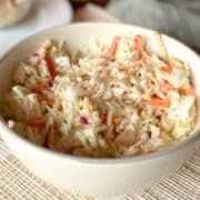 A bowl of cabbage apple salad