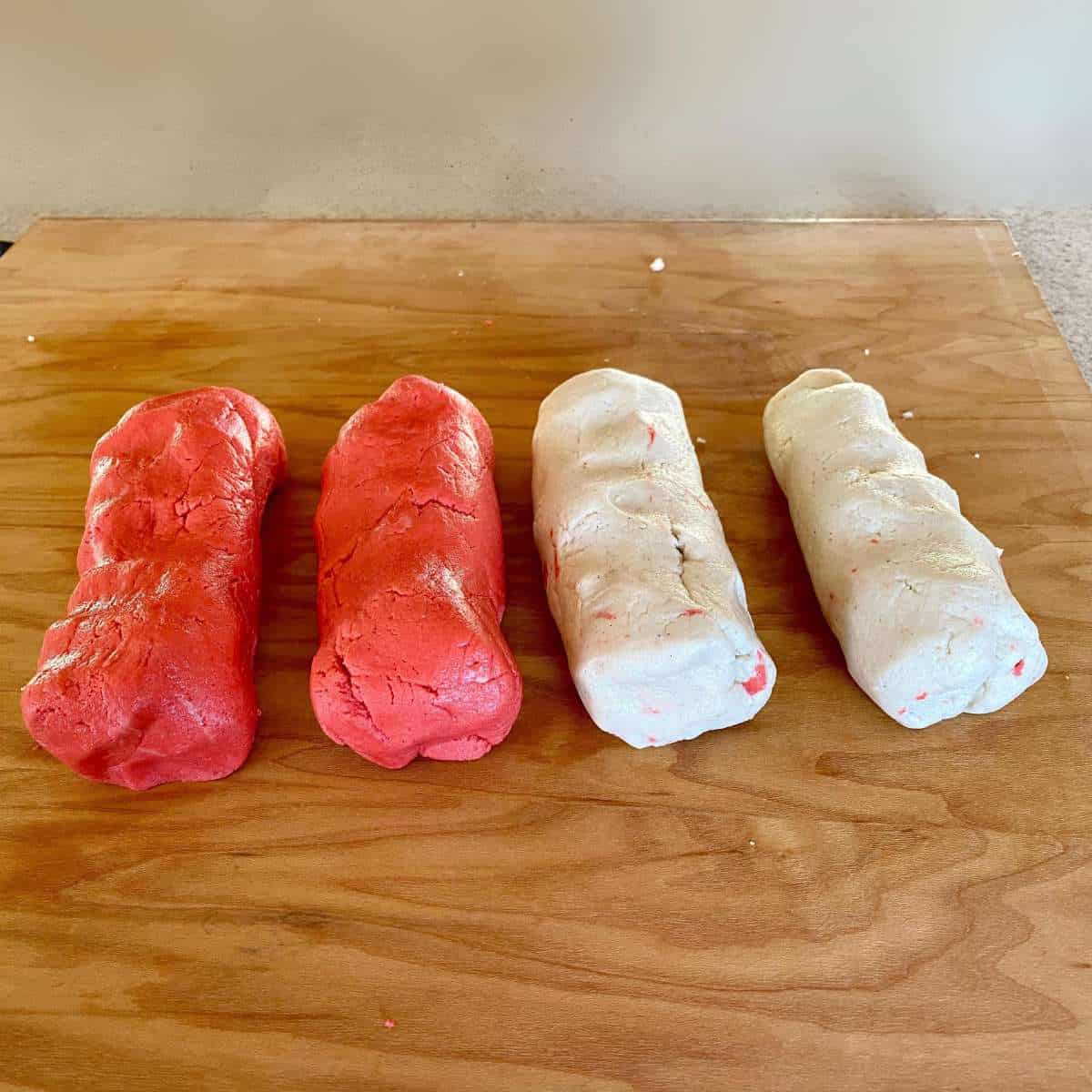 Logs of red and white dough.